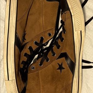 Converse brand suave shoes. One star high tops, worn.